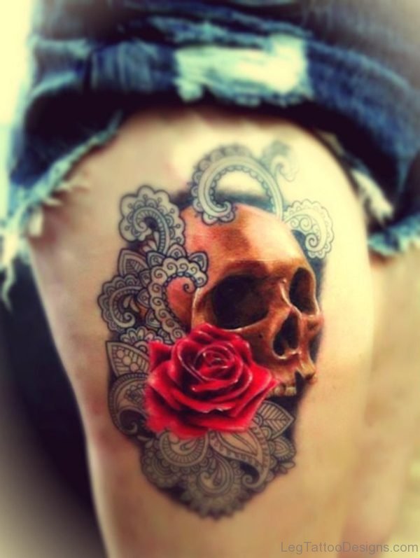 Skull And Unique Tattoo On Thigh