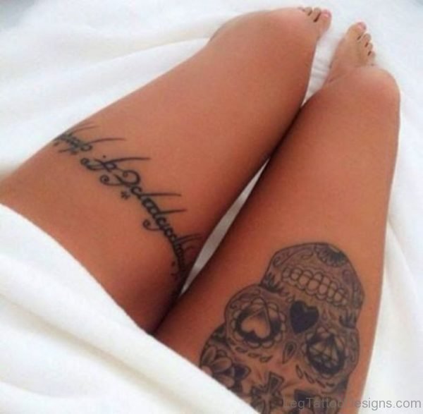 Skull And Wording Tattoo
