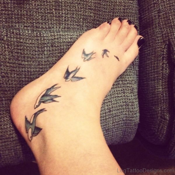 Small Bird Tattoo On Foot