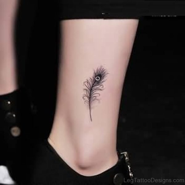 Small Black Ink Peacock Feather Tattoo