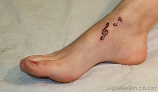 Small Musical Tattoo On Foot 