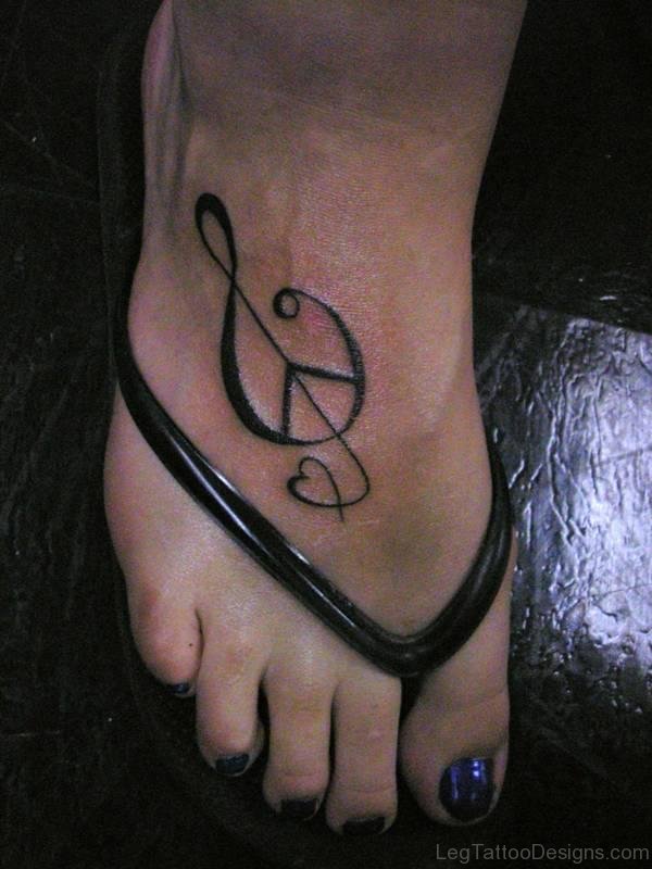 Unique Musical Tattoo On Foot 