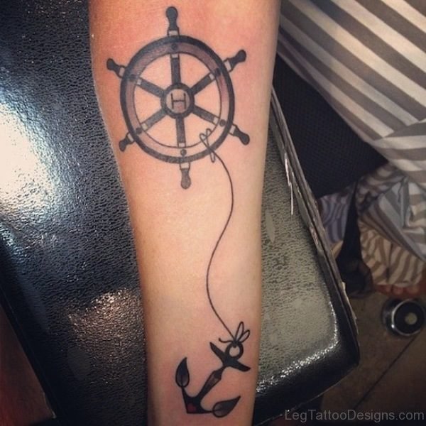 Wheel And Anchor Leg Tattoo